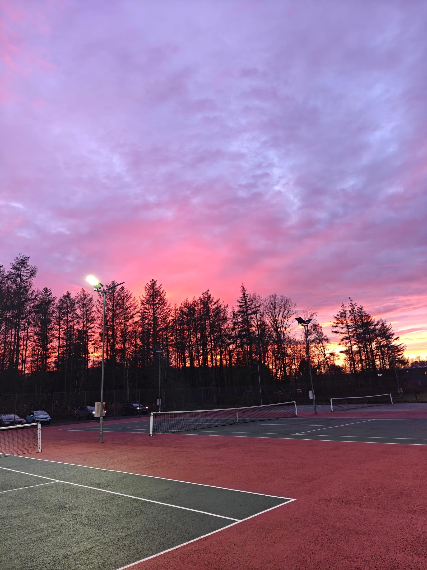 Sunset over the academy's tennis courts